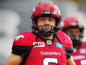 Calgary Stampeders Rob Maver runs onto the field during player introductions before facing the Ottawa Redblacks in CFL football in Calgary, Alta., on Saturday, September 17, 2016. AL CHAREST/POSTMEDIA