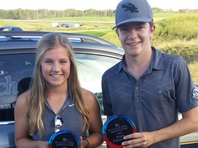 Cassidy Laidlaw (Bearspaw) and Reid Woodman (Blackhawk) show off their hardware after winning the titles at the 2016 McLennan Ross Junior Golf Tour Championship at Wolf Creek Resort. (Courtesy of McLennan Ross Junior Golf Tour)