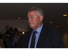 Federal Court Justice Robin Camp arrives at a Canadian Judicial Council inquiry in a Calgary hotel, Friday, September 9, 2016.