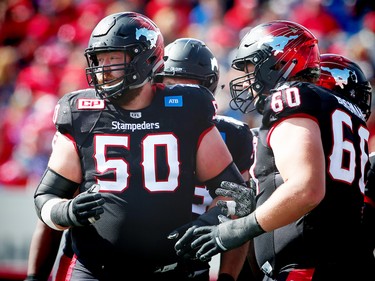 Calgary Stampeders Spencer Wilson and Shane Bergman against the Edmonton Eskimos during CFL football in Calgary, Alta., on Monday, September 5, 2016. AL