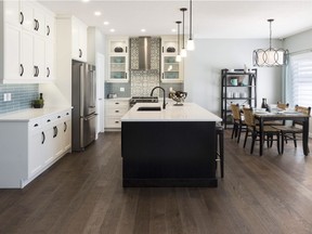 The kitchen in the Aydon 2 show home by ReidBuilt Homes in Vista Crossing in Crossfield.