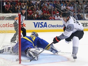 Johnny Gaudreau of Team North America scores a first period goal against Henrik Lundqvist of Team Sweden at the World Cup of Hockey tournament at the Air Canada Centre on September 21, 2016 in Toronto, Canada. With Calgary Flames camp opening Thursday the question is will Gaudreau attend without a contract?