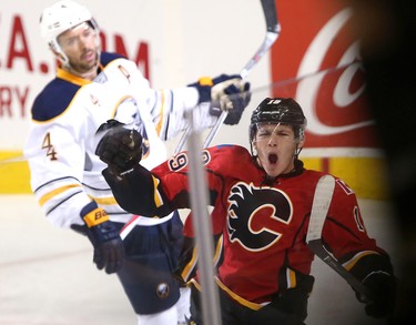 Calgary Flames Matthew Tkachuk, celebrates his  goal on Buffalo Sabres in NHL hockey action at the Scotiabank Saddledome in Calgary, Alta. on Tuesday October 18, 2016. Leah Hennel/Postmedia