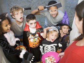 Six children trick or treating on Halloween