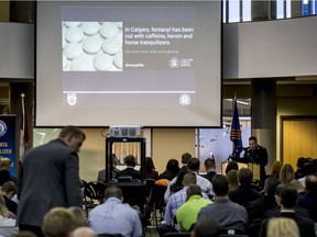 Law enforcement representatives gather for the 2016 Fentanyl Conference at the Calgary Police Service headquarters in Calgary on Monday, Oct. 17.