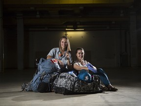 CALGARY, AB -- Brittany Pontes, an OPN at the Children's Hospital, right, and Jeanele Bonnaventure, a RN at the Foothills Hospital, pose for a photo in Calgary, on October 8, 2016, a few days before they depart to Hurricane Matthew ravaged Haiti, where they will work as hospital volunteers with a non-profit called Medishare.  (Crystal Schick/Postmedia)
