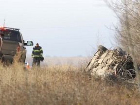 Scene of a fatal collision at Big Knife Road and Six Mile Coulee Road on the Tsuut'ina Nation west of Calgary, Ab., on Saturday October 29, 2016. Mike Drew/Postmedia