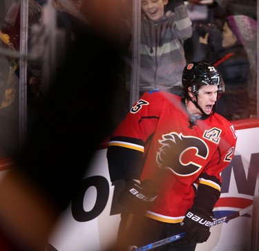 Calgary Flames Sean Monahan, celebrates his overtime goal on Buffalo Sabres in NHL hockey action at the Scotiabank Saddledome in Calgary, Alta. on Tuesday October 18, 2016. Leah Hennel/Postmedia