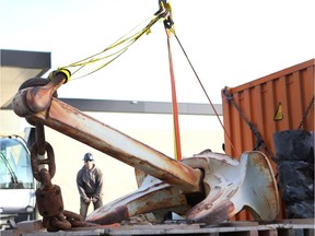 A 9 tonne, 12 foot long anchor from the HMCS Protecteur arrives on a flatbed truck and is unloaded at the Military Museum in Calgary, Alta on Wednesday October 26, 2016. The Naval Museum Society will create a monument  dedicated to the men and women who have served in the Royal Canadian Navy during the last century. Jim Wells//Postmedia