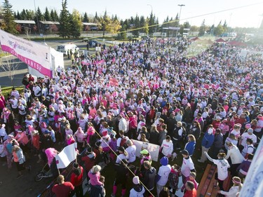 A throng squeezes through the start line of the Canadian Breast Cancer Foundation CIBC Run for the Cure at Southcentre Mall in Calgary, Alta., on Sunday, Oct. 2, 2016.