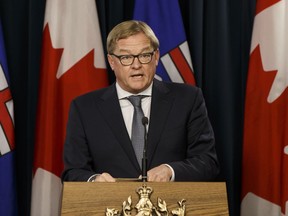 Alberta Education Minister David Eggen speaks about his department's closure of Trinity Christian School Association during a press conference at the Alberta Legislature in Edmonton, Alberta on Tuesday, October 25, 2016. Ian Kucerak / Postmedia