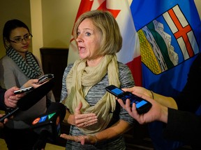 Alberta Premier Rachel Notley speaks to reporters at the McDougall Centre in Calgary on Tuesday, Oct. 4, 2016.