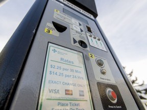 An Alberta Health Services parking-payment  kiosk stands at Rockyview General Hospital in Calgary, Alta., on Wednesday, Feb. 3, 2016. Hospital parking and its rates are under the microscope, with some questioning if it's essentially a tax on the sick. Lyle Aspinall/Postmedia Network