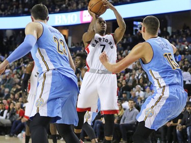 The Toronto Raptors' Kyle Lowry shoots during the NBA preseason game between the Denver Nuggets and Toronto Raptors at the Scotiabank Saddledome in Calgary on Monday Oct. 3, 2016.