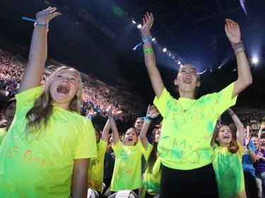 Students cheer during WE Day at the Scotiabank Saddledome in Calgary on Wednesday October 26, 2016.