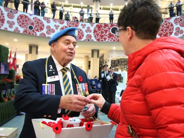 Veteran Skip Saunders, who has sold poppies for the last 17 years at Chinook Centre, continues the tradition during the launch of the Calgary Poppy Fund campaign at the mall on Saturday October 29, 2016.