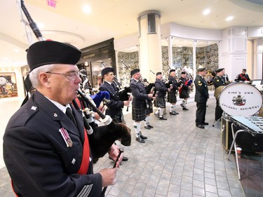 The Kings's Own pipes and drums plays at the launch of the annual poppy fund campaign at  Chinook Centre on Saturday October 29, 2016.