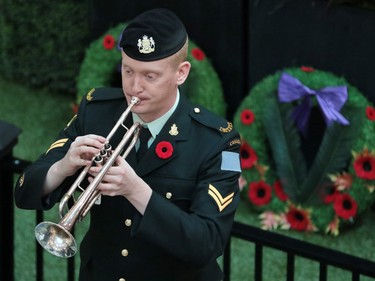 The last post is played during the launch of the annual Calgary Poppy Fund campaign at  Chinook Centre on Saturday October 29, 2016.