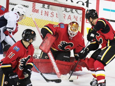 Calgary Flames goaltender Brian Ellliott stopped this Washington Capitals scoring chance during NHL action at the Scotiabank Saddledome in Calgary on Sunday October 30, 2016.