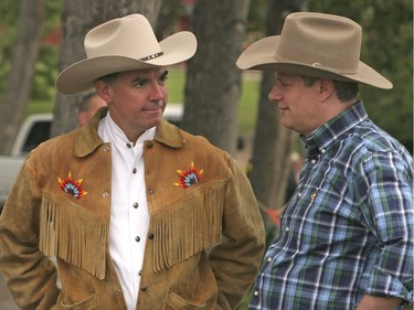 Calgary-07/08/07- Federal Indian Affairs Jim Prentice talks to Prime Minister Stephen Harper at the Senator Hays' Breakfast at Heritage Park.Photo by Christina Ryan/Calgary Herald (for City story-Reporter Jason Fekete)