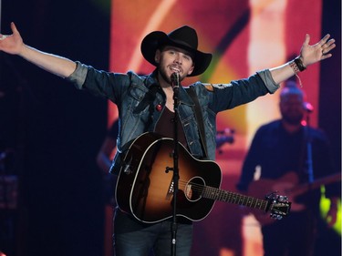 Country singer Brett Kissel sings during the WE Day event at the Scotiabank Saddledome in Calgary on Wednesday October 26, 2016.