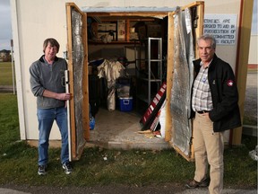 David Cox, President, left and Chris Shelver, Director of Communications with the Citadel Community Association stand beside a building at the community's rink on Tuesday Oct. 4, 2016. The association had $6000 worth of ice equipment stolen from the building last week but ATB Financial has come to the rescue with money to replace the stolen items. Gavin Young/Postmedia