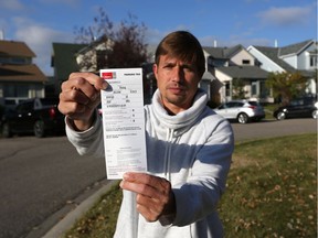 Martin Morett and his neighbours woke up on Thursday October 6, 2016, to find parking tickets on their vehicles parked around the cul-de-sac of Woodmount Green S.W. in Calgary, Alta.