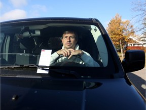 Martin Morett and his neighbours woke up on Thursday October 6, 2016, to find parking tickets on their vehicles parked around the cul-de-sac of Woodmount Green S.W. in Calgary, Alta. Leah Hennel/Postmedia