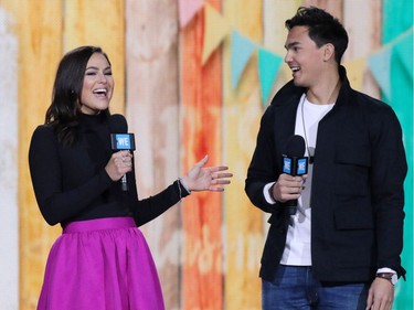 Hosts Chloe Wilde and singer Tyler Shaw talk on stage during the WE Day event at the Scotiabank Saddledome in Calgary on Wednesday October 26, 2016.