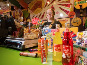 Jessie Smyth shows some of the sugar laden treats on offer at the Freak Lunchbox candy store in Calgary on Monday October 24, 2016.  GAVIN YOUNG/POSTMEDIA