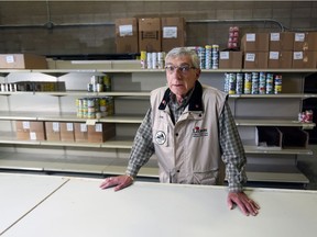 Joey Bleviss, Chief Adminstrative Officer with the Calgary Poppy Fund and Veterans Food Bank, stands amongst the many bare shelves in the food bank's warehouse on Thursday October 27, 2016.  GAVIN YOUNG/POSTMEDIA