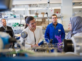 Science Minister Kirsty Duncan tours a lab at the University of Calgary after announcing a new competition for 11 Canada Excellence Research Chair positions.
