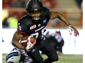 Calgary Stampeders Kamar Jorden is tackled by Toronto Argonauts Marcus Alford in CFL action at McMahon Stadium in Calgary, Alta.. on Friday October 21, 2016