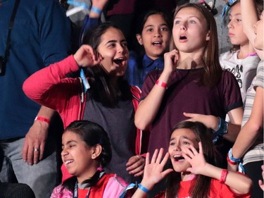 Students cheer during the WE Day event at the Scotiabank Saddledome in Calgary on Wednesday October 26, 2016.