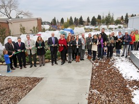 Students, staff, volunteers and dignitaries mark the official opening of Altadore School's Owl's Nest Too edible garden on Thursday October 13, 2016. The approximately 1/4 acre garden was created over 2 years with over 7000 volunteer hours. Gavin Young/Postmedia