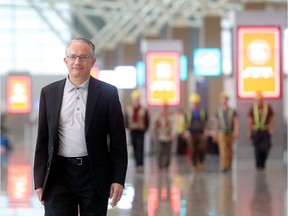 Garth Atkinson, CEO of the Calgary Airport Authority, walks through the new International terminal Wednesday September 28, 2016.