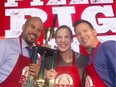 Co-Pigout Champions, former Stampeders running back Jon Cornish and retired Team Canada Rugby player Maria Samson, join host Eric Francis, right, at his annual Eric Francis Pizza Pigout Wednesday night October 19, 2016 at Cowboys.