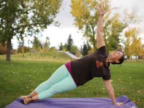 Yoga instructor Johanna Steinfeld demonstrates the Vashistasana/Side plank for her October 2016 yoga column. Gavin Young/Postmedia