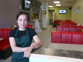 Cam Do poses at Rau Bistro in northwest Calgary, Alta on Friday October 21, 2016. The Vietnamese restaurant is located on 4 St NW near 40 Ave. Jim Wells//Postmedia