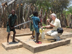Colin Glassco at one of the 600-plus wells his foundation, The Colin B. Glassco Charitable Foundation for Children has drilled in Zambia.