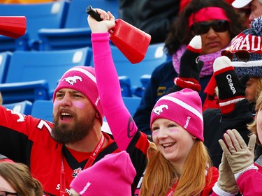 Calgary Stampeders fans cheer their team as they play the Montreal Alouettes during CFL action at McMahon Stadium in Calgary on Saturday October 15, 2016. Gavin Young/Postmedia