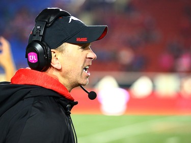 Calgary Stampeders head coach Dave Dickenson yells instructions to players during CFL action against the Montreal Alouettes at McMahon Stadium in Calgary on Saturday October 15, 2016.  Gavin Young/Postmedia
