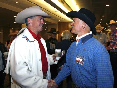 CALGARY, AB: JULY 3, 2009 — Calgary MP Jim Prentice chats with national NDP leader Jack Layton at Calgary Stampede President's Breakfast at Telus Convention Centre Friday July 3, 2009.