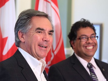 Gavin Young, Calgary Herald CALGARY, AB: SEPTEMBER 09, 2014 -- Alberta premier designate Jim Prentice and Calgary Mayor Naheed Nenshi share a laugh while talking with the media after meeting at Calgary's City Hall on Tuesday September 9, 2014. Gavin Young/Calgary Herald (For City section story by James Wood) Trax# 00058654A