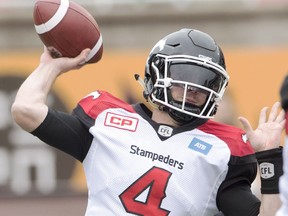 Calgary Stampeders quarterback Drew Tate throws a pass during first quarter CFL football action against the Montreal Alouettes Sunday, October 30, 2016 in Montreal.