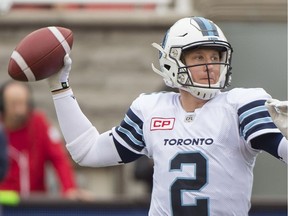 Toronto Argonauts quarterback Drew Willy throws a pass during first half CFL football action against the Montreal Alouettes in Montreal, Sunday, October 2, 2016.