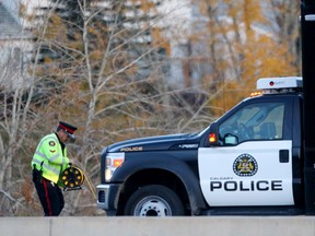 Police investigate the scene of a possible hit and run on 16 Avenue N.W.