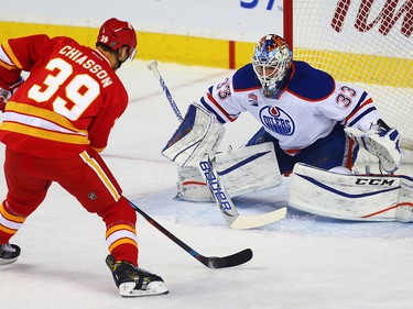Edmonton Oilers Cam Talbot makes a save on a shot by Alex Chiasson of the Calgary Flames during NHL hockey in Calgary, Alta., on Friday, October 14, 2016. AL CHAREST/POSTMEDIA