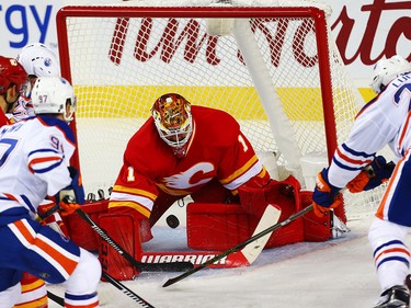 Edmonton Oilers Jordan Eberle scores on Calgary Flames goalie Brian Elliott during second period in NHL hockey in Calgary, Alta., on Friday, October 14, 2016. AL CHAREST/POSTMEDIA