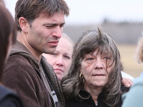 Evelyn Thompson, her son Brad Thompson (L) and other family members  talk with the media after giving emotional victim impact statements during a parole hearing for Harold Smeltzer. Smeltzer murdered their daughter and sister, 5 year old Kimberley Thompson in 1980 in Calgary.